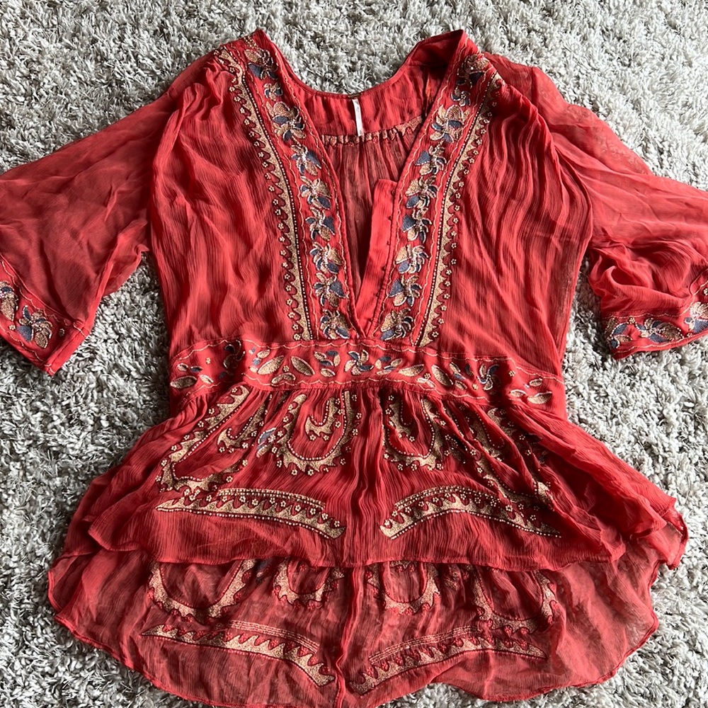 Free People blouse! Size S, but a bit oversized.